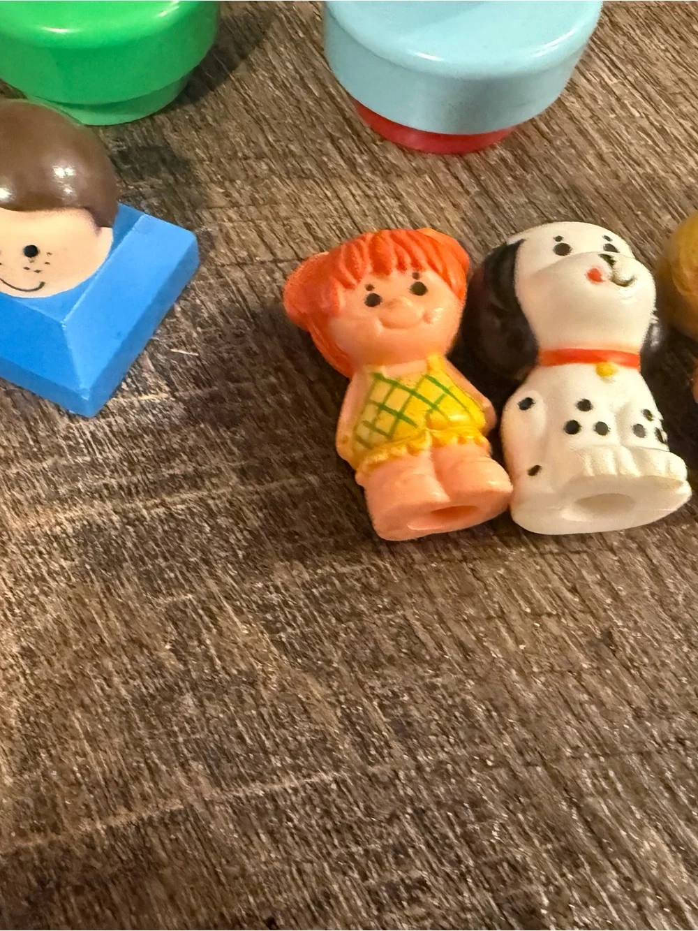 Fisher-Price Peg People Set with Bright Yellow, Blue, Green, Red, Brown